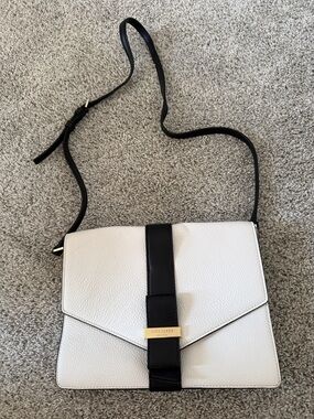 kate spade White Pebbled Crossbody with Black Strap and Gold Logo Plate